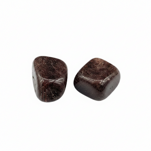 Two brown stones on a white background