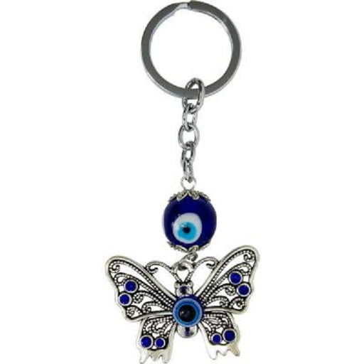 Keychain with butterfly design and blue evil eye charm on a white background