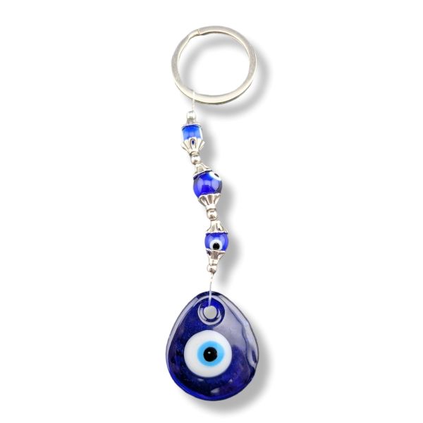 Blue evil eye keychain with silver ring on a white background