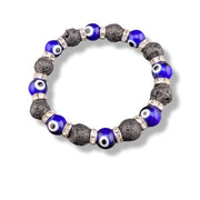 Bracelet with blue beads and silver accents on a white background