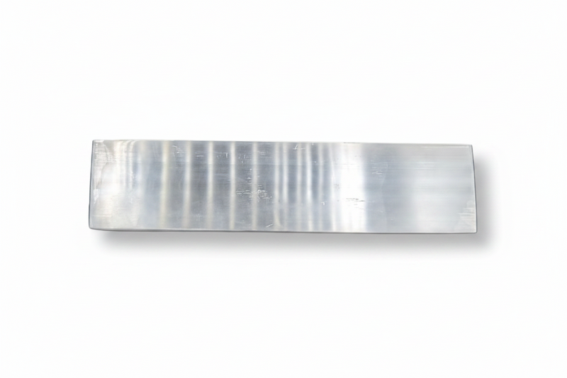 A rectangular selenite  block with a brushed finish, shown on a clean white background with a soft drop shadow.