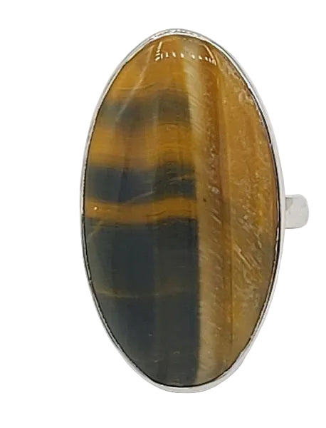 Ring with a large oval tiger's eye stone on a white background