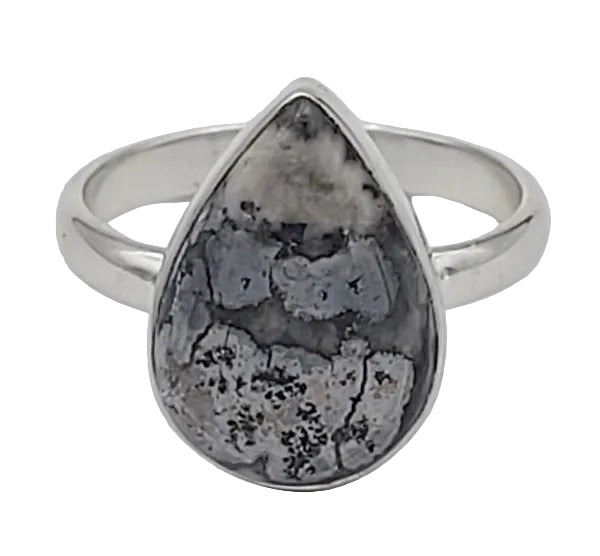 Silver ring with a teardrop-shaped stone on a white background