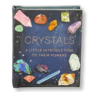 Book titled 'Crystals: A Little Introduction to Their Powers' with illustrations of crystals on a dark blue background.
