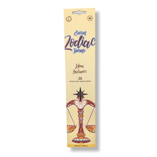 A tall, narrow package of 'Zodiac  incense sticks, specifically 'Libra Balance' (Vanilla/Ambar). The packaging is a light beige wood-grain texture with blue and purple stylized lettering and an illustration of the Libra zodiac symbol featuring a scale of justice.