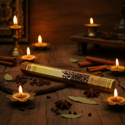 Hem Incense Hex Clove 20 pack on a wooden surface surrounded by candles and spices