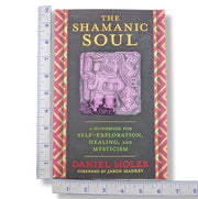 The Shamanic Soul guidebook by Daniel Moler, displayed vertically with a metal ruler on each side to show its height and width against a white background.