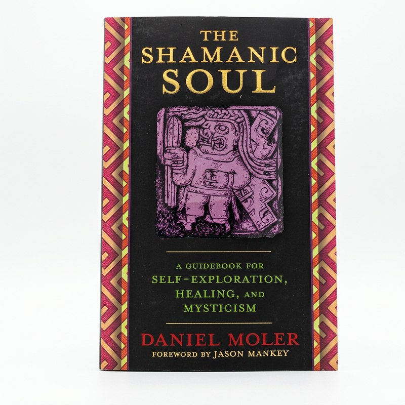 The Shamanic Soul book by Daniel Moler, featuring a black cover with gold lettering, a purple Aztec-style illustration, and red and gold patterned side borders, photographed on a white background.
