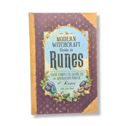 Book titled 'The Modern Witchcraft Guide to Runes' on a white background