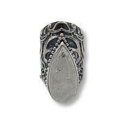 Silver ring with teardrop-shaped stone on a white background
