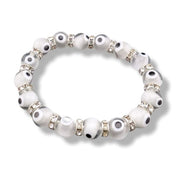 White beaded bracelet with rhinestones on a white background
