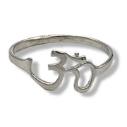 Silver ring with Om symbol on a white background