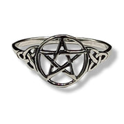 Silver ring with pentagram design on a white background