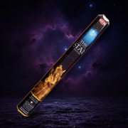 A single incense stick package labeled 'The Star ' , shown diagonally against a dramatic starry night sky background with purple clouds and a dark reflective surface.