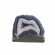 Geode with purple interior on a white background
