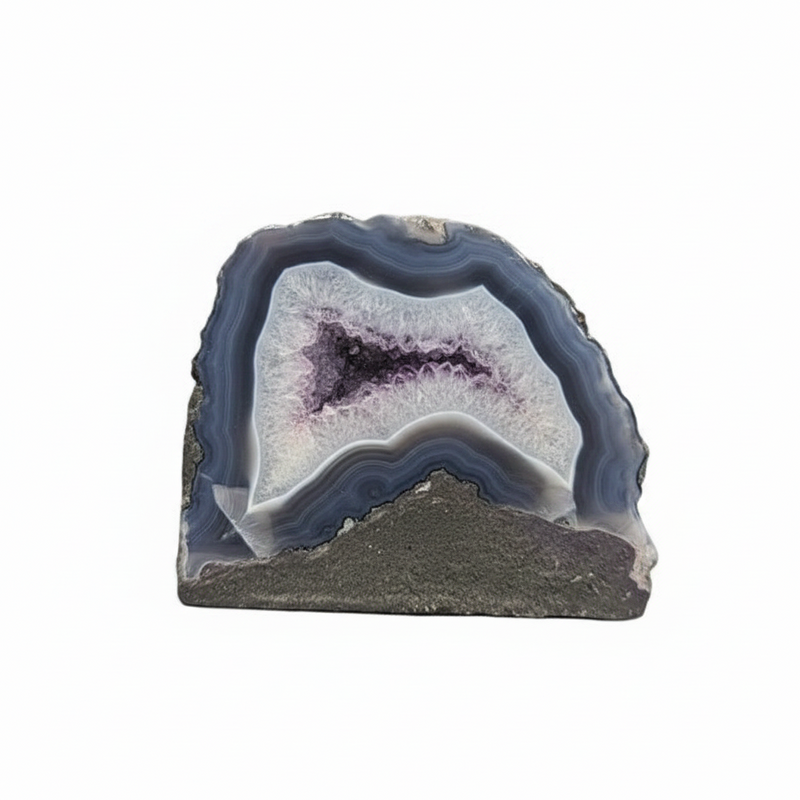 Geode with purple interior on a white background
