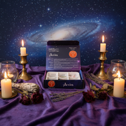 Aries astrological crystal set with candles and lavender on a starry night background
