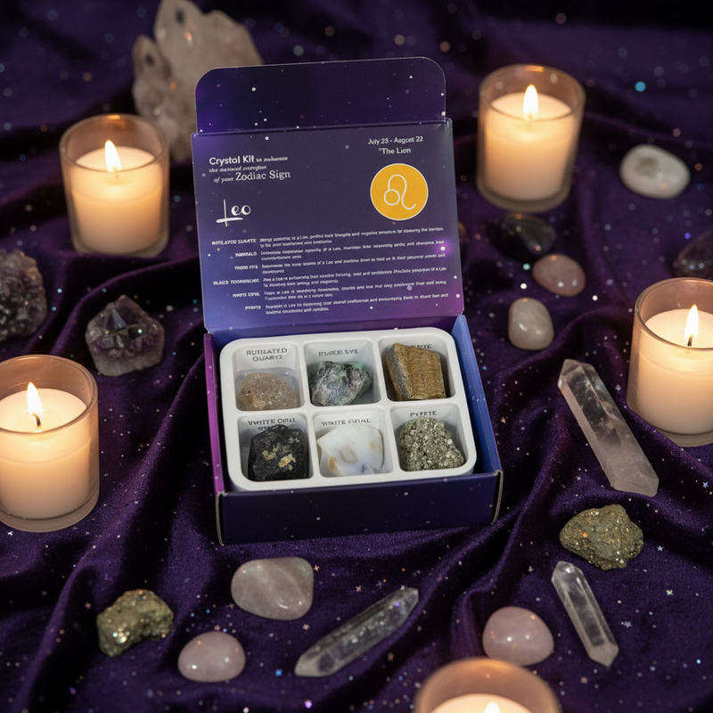 Zodiac Crystal Kit Leo with candles and crystals on a purple fabric background