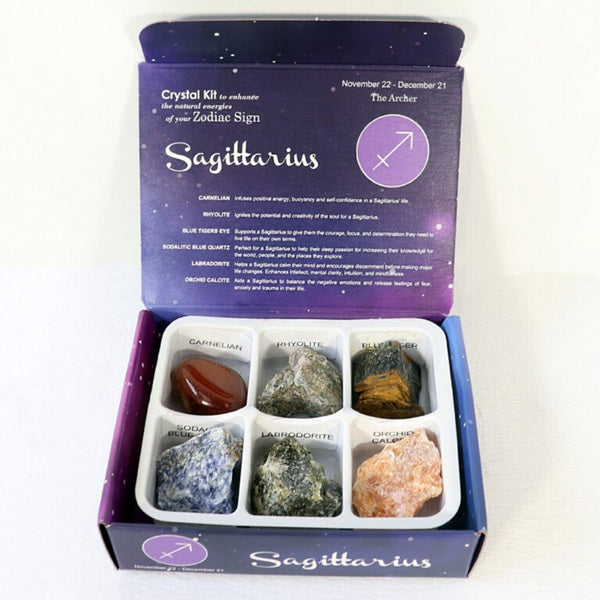 Crystal kit for Sagittarius with six stones in a box on white background