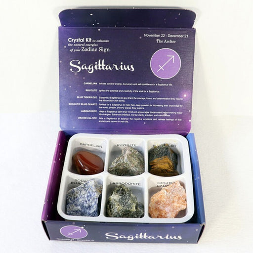 Crystal kit for Sagittarius with six stones in a box on white background