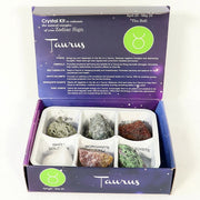 Taurus crystal kit with stones in a purple box on a white background