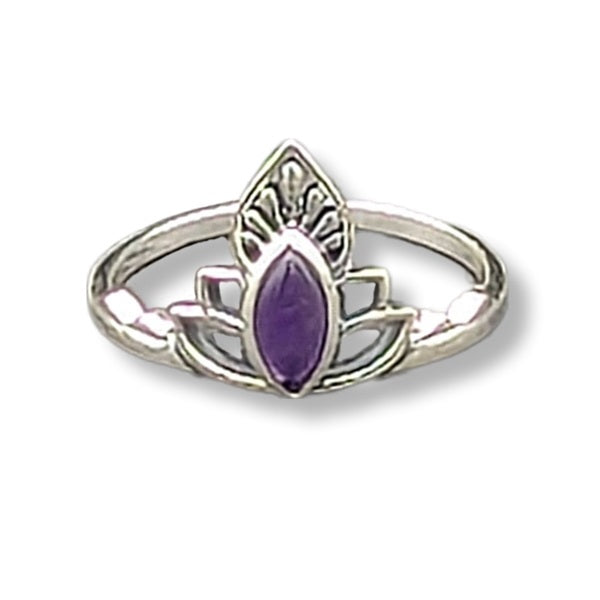 Silver ring with a purple gemstone on a white background