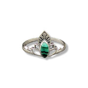 Silver ring with a green gemstone on a white background