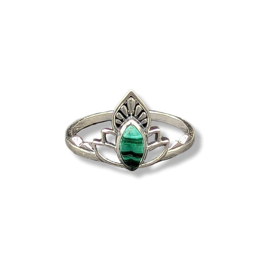 Silver ring with a green gemstone on a white background