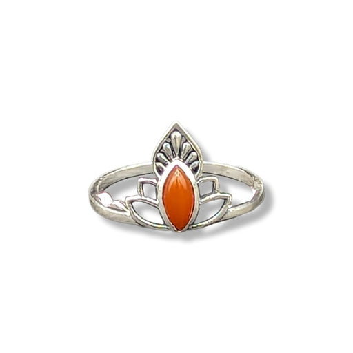 Silver ring with an orange stone on a white background