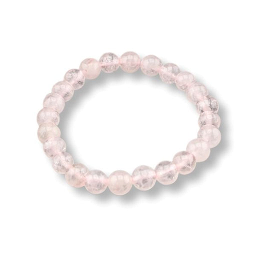A beaded stretch bracelet made of translucent light pink round beads, shown on a clean white background with a soft drop shadow.