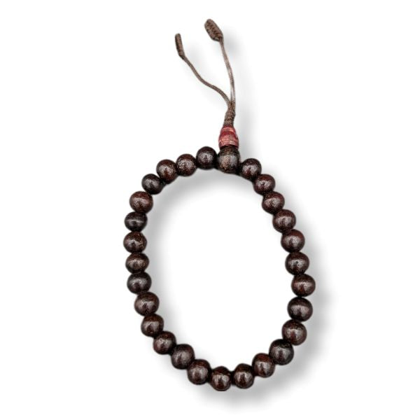 Wooden beaded bracelet on a white background