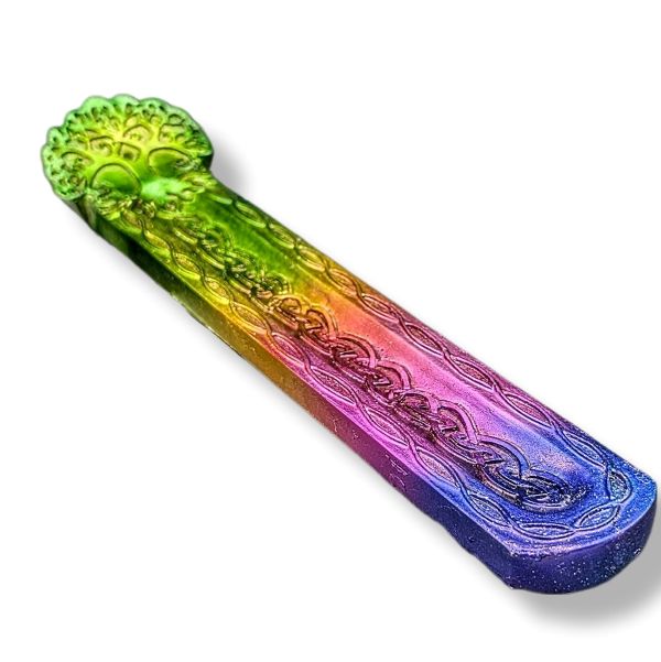 Multicolored decorative incense burner tree of life with intricate patterns on a white background