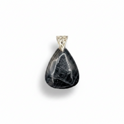 Teardrop-shaped pendant with a textured surface on a white background