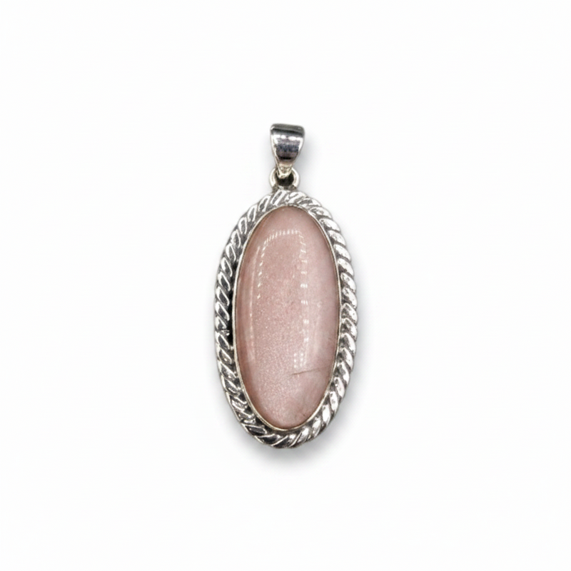 Pink stone pendant with silver frame on a white background