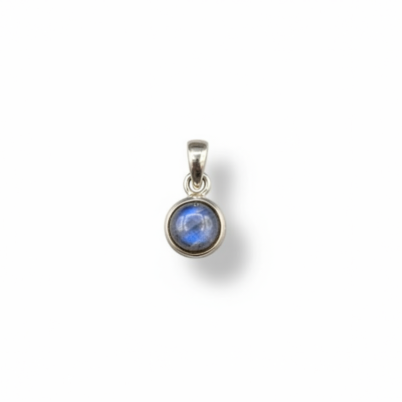 Silver pendant with a blue gemstone on a white background