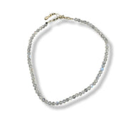 Anklet with small stones on a white background