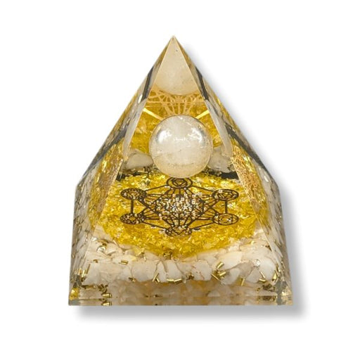 Orgonite pyramid with Clear Quartz sphere, Citrine, Snow Quartz, and Metatron symbol on a white background