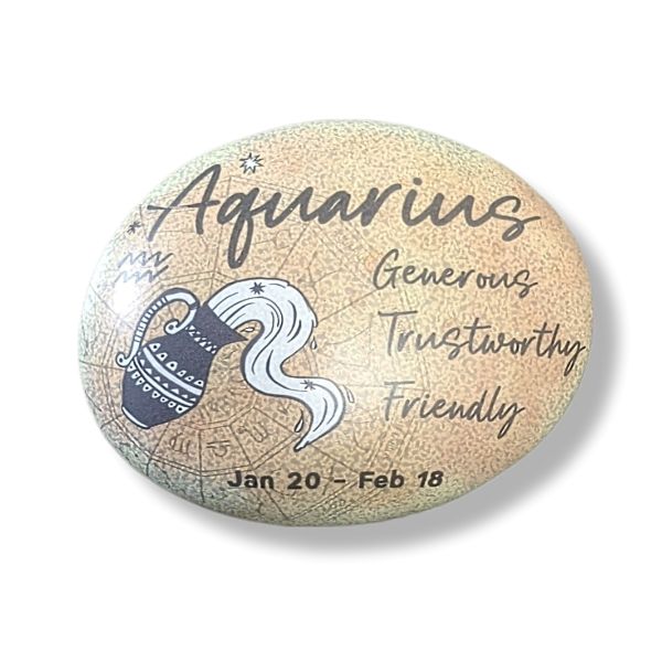 Round stone with Aquarius zodiac design and text on a white background