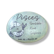 Pisces zodiac art stone on a white background