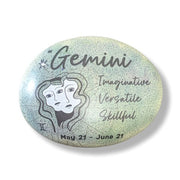 art stone with Gemini zodiac design on a white background