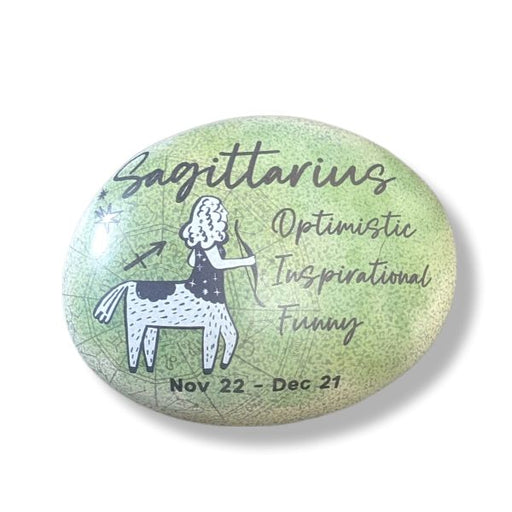 Art stone with Sagittarius zodiac design on a white background