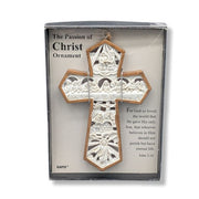 Decorative cross ornament in packaging with religious text