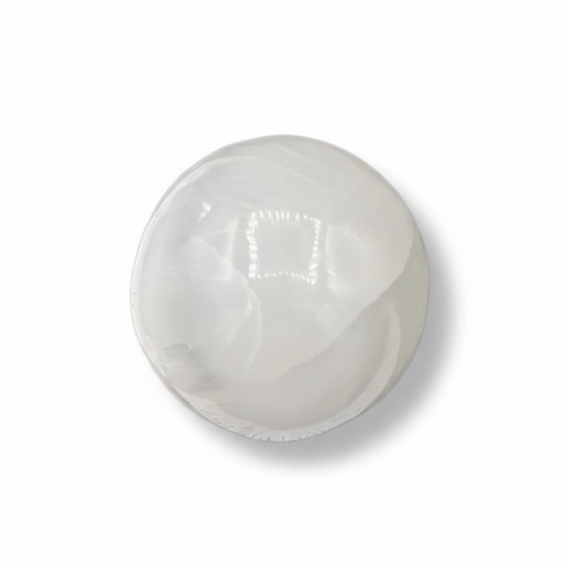 A selenite sphere on a white background