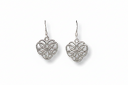 Pair of silver heart-shaped earrings with intricate designs on a white background