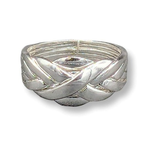 a sterling silver puzzle ring on a white background