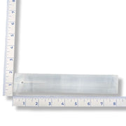White selenite incense holder 8-inch next to a ruler on a white background