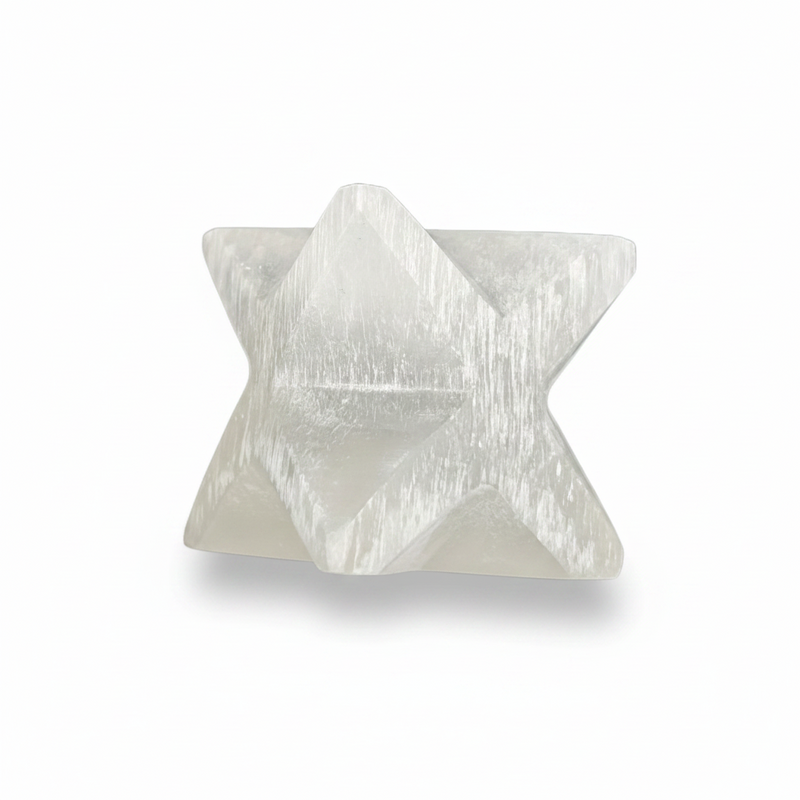 A white geometric star-shaped crystal cluster, resembling a tetrahedron with six-pointed star facets, shown on a clean white background with a soft shadow.