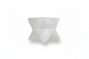 A Selenite Merkaba shown on a clean white background with a soft shadow.