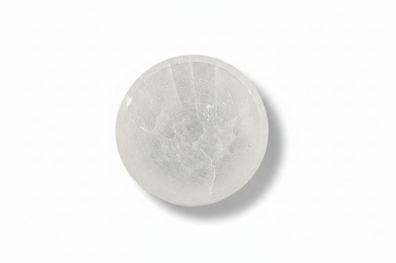 A selenite bowl shown on a clean white background with a soft drop shadow.