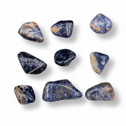 Set of blue and orange stones on a white background